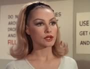 April Conquest (Julie Newmar)